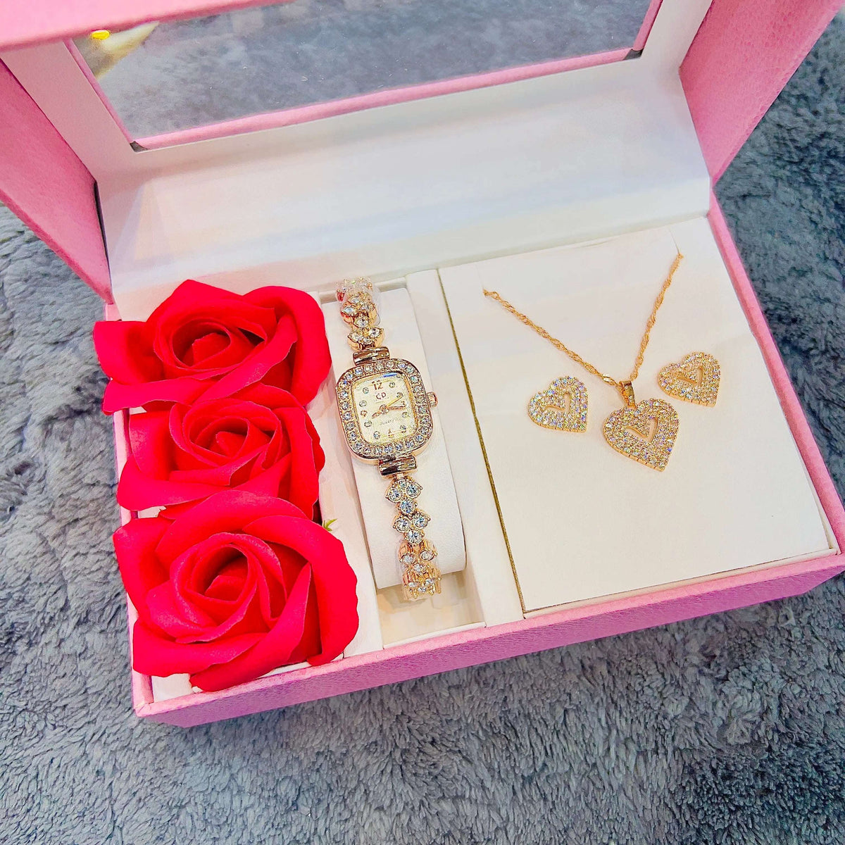 Rose gold-tone watch and heart charm necklace set with matching bracelet and stud earrings