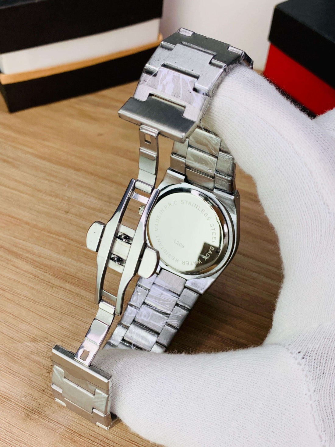 Men's silver-tone chronograph wristwatch with black dial and metal link bracelet
