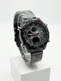 Silver metal sports watch with black dial, dual subdials, tachymeter bezel