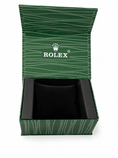 Green Rolex watch box with open lid and black insert
