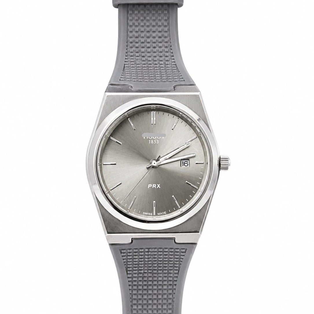 Men's silicone strap watch with light dial and gray rubber band, round steel case.