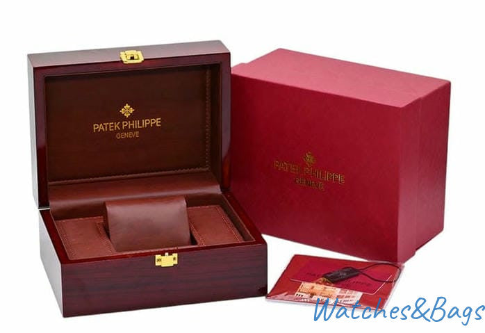 Patek Philippe watch box set with papers and bag, open dark-brown box and red lid