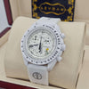 White chronograph watch with tachymeter bezel, moonphase subdials, white band