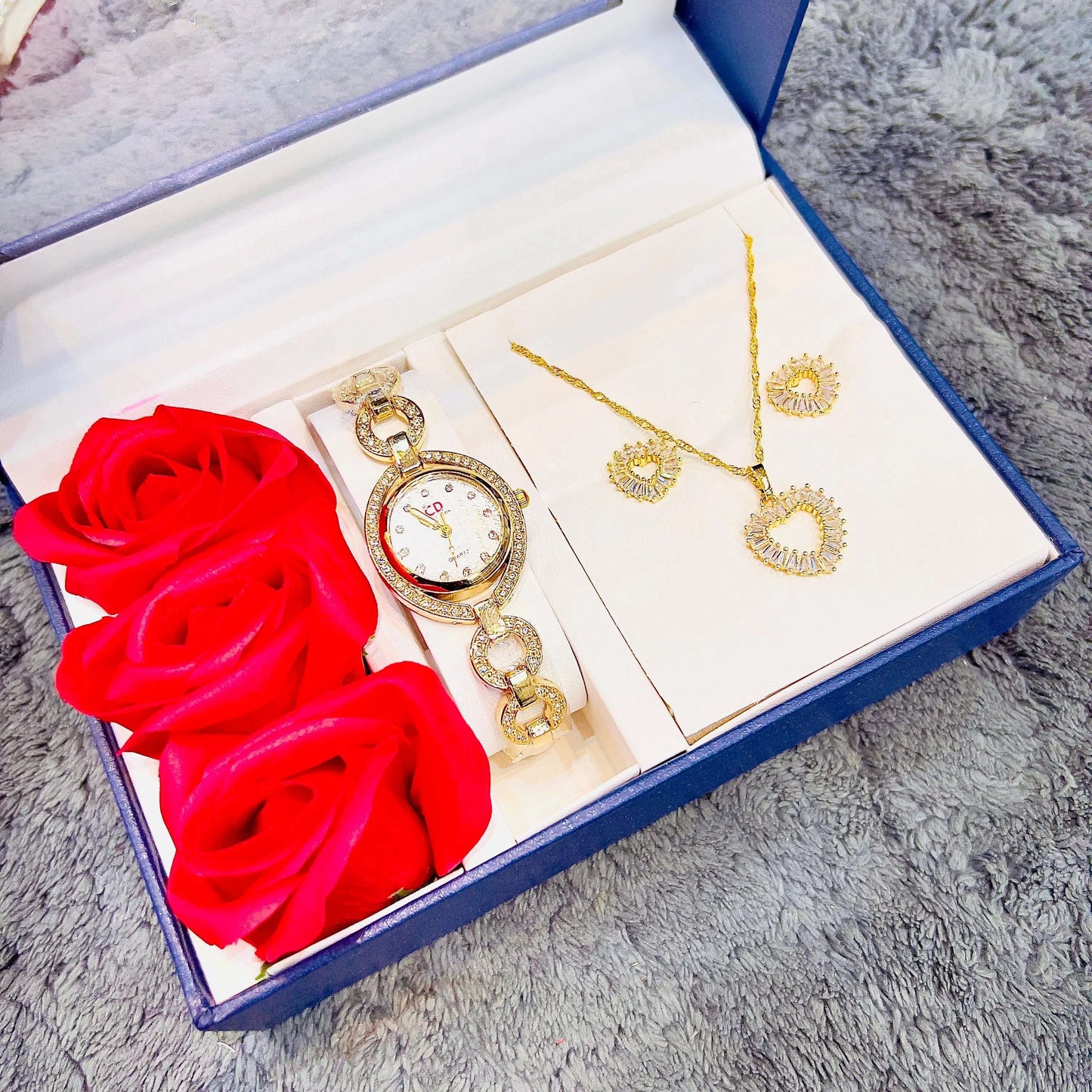 Gold-tone watch and pendant necklace set with butterfly charms and matching stud earrings