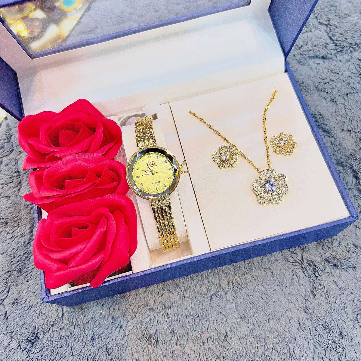 Gold-tone watch and butterfly pendant necklace set with matching bracelet and stud earrings