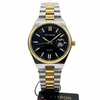 Two-tone men’s quartz wristwatch with black dial, gold bezel, metal bracelet.
