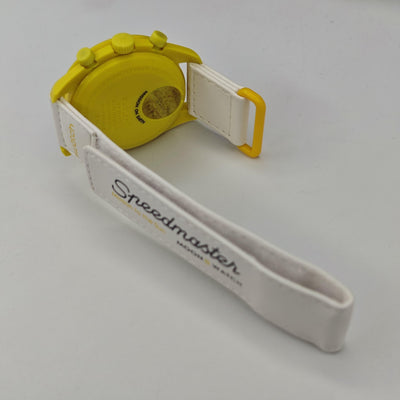 Yellow-dial chronograph wristwatch with white case and white strap