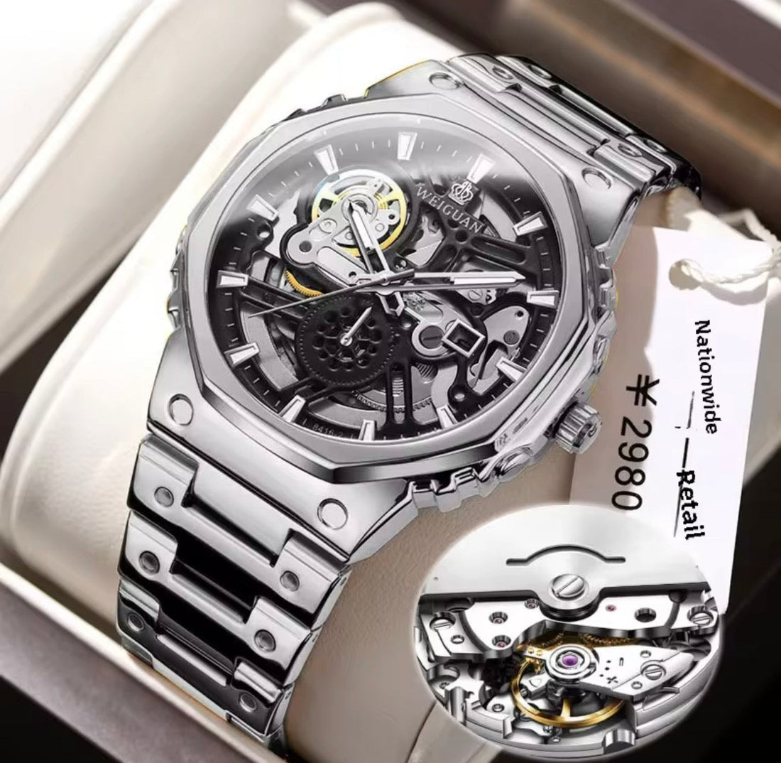 Men's silver skeleton watch with open-work dial and metal bracelet