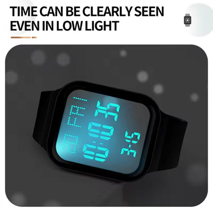 Black silicone square digital LED watch with cool blue backlit display and time digits