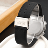 Men's wristwatch close-up: black leather strap buckle with engraved initials on silver case