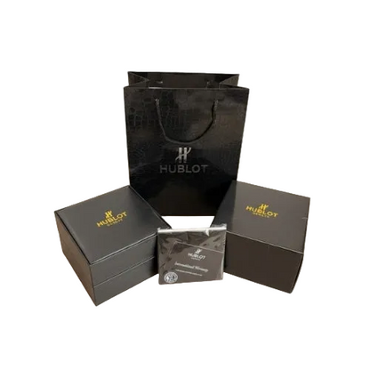 Hublot watch box set with black gift bag, gray boxes, and authentication card pouch
