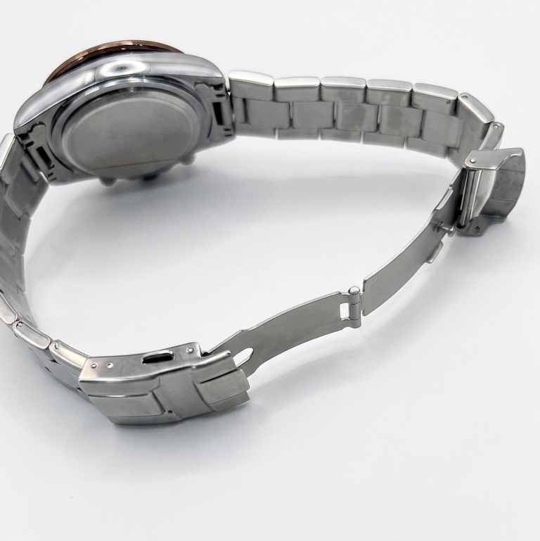 Rolex Daytona stainless steel bracelet watch with clasp and side crown