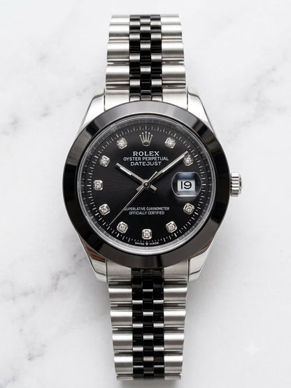 Stainless steel luxury watch with black dial, Rolex date display, diamond markers
