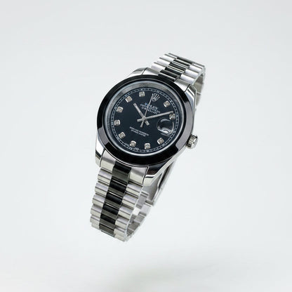 Men's Rolex wristwatch with black dial and silver bracelet, angled view