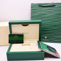 Rolex green lacquered watch box closed with wave texture and gold crown logo